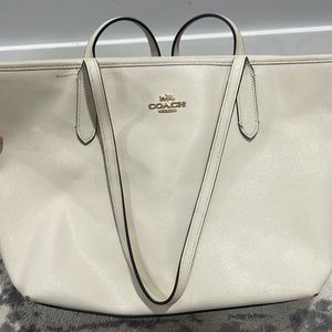 White tote by Coach.